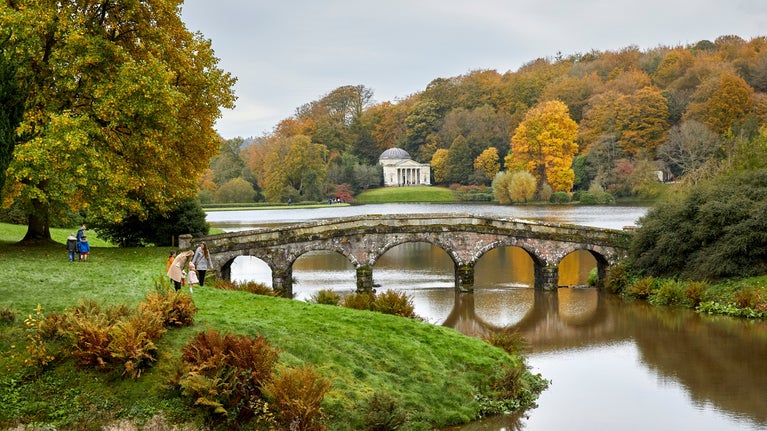 An autumn view of the Pantheon and the Palladian Bridge at Stourhead.
